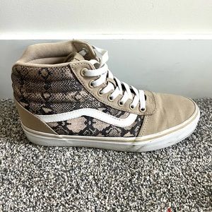 Vans women’s snakeskin high tops, size 8, used but in great condition.